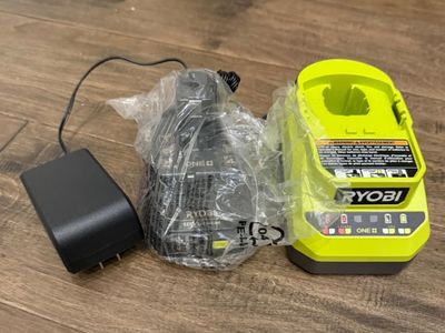 Brand new never used Ryobi Battery + Charger
