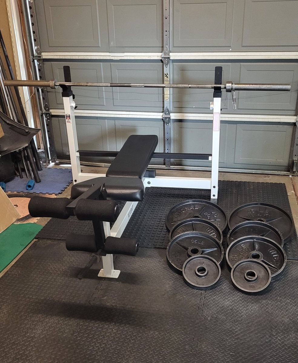 Bench and 250 pounds of weights