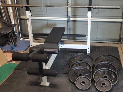 Bench and 250 pounds of weights