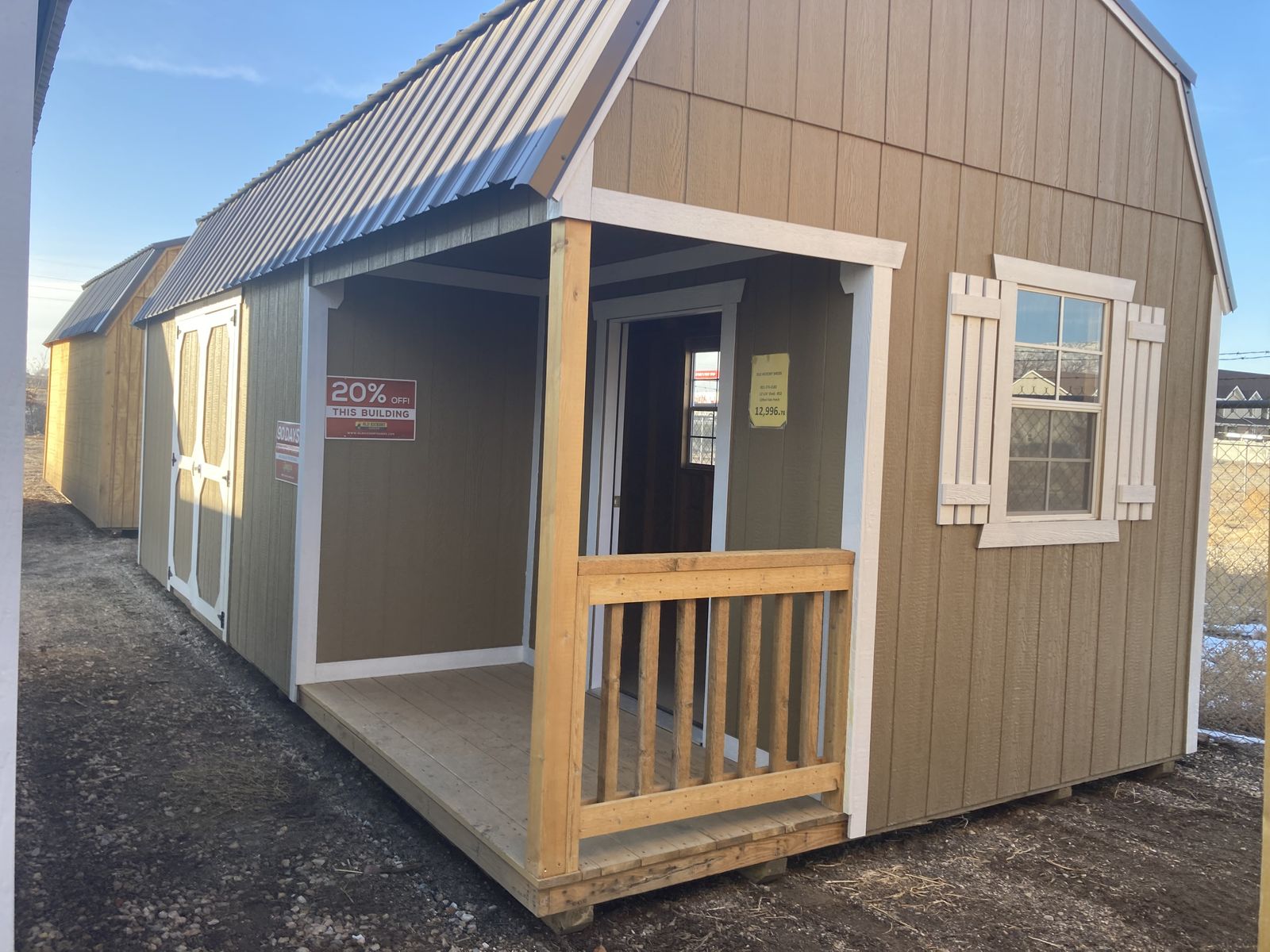 12x24 Side Porch Lofted Barn Shed with shelves. 20% OFF Display Model!