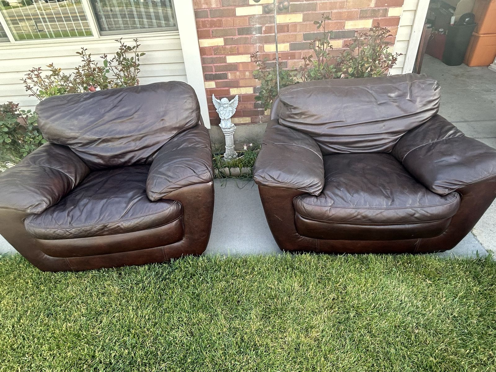 Comfy Pair of Real Leather Large Violino Chairs 46 wide, 40 deep and 36 tall, good condition.