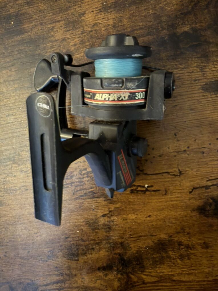 Shakespeare Alpha XT Graphite Spinning Reel Used