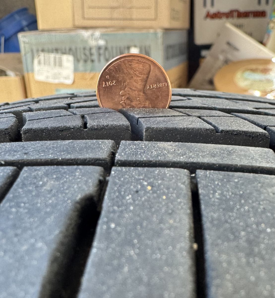 Good used tire, plenty of tread left, no damage.