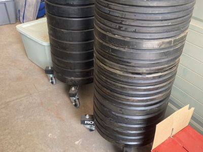 Rogue Fitness Rubber Bumper Plates Stacks with Wheels