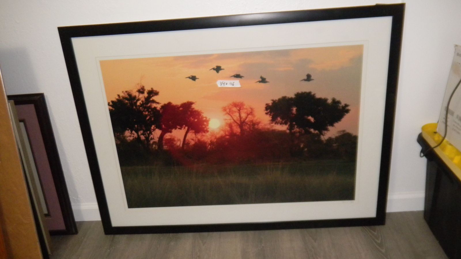 Signed  Howard Ruby  Storks sunset 
