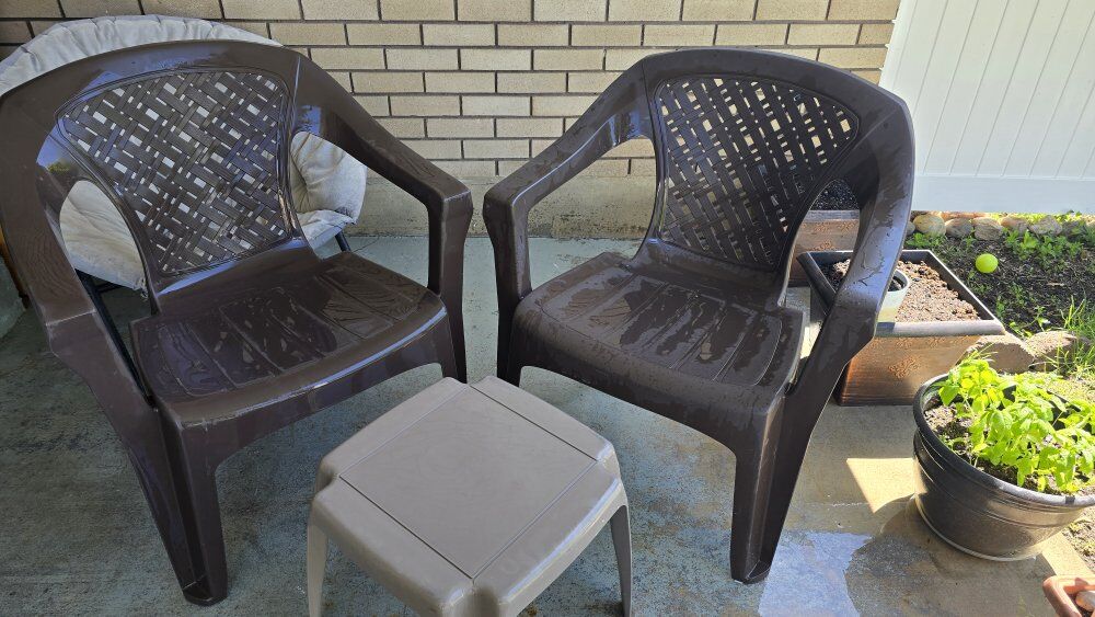 2 Dark brown arm chairs