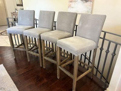 4 bar height gray upholstered barstools