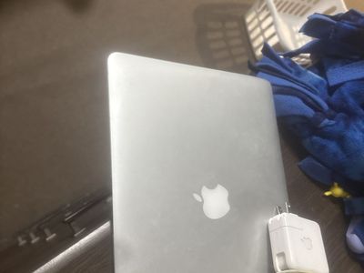Old MacBook screen burnt out, needs to be cleaned, but in fair condition
