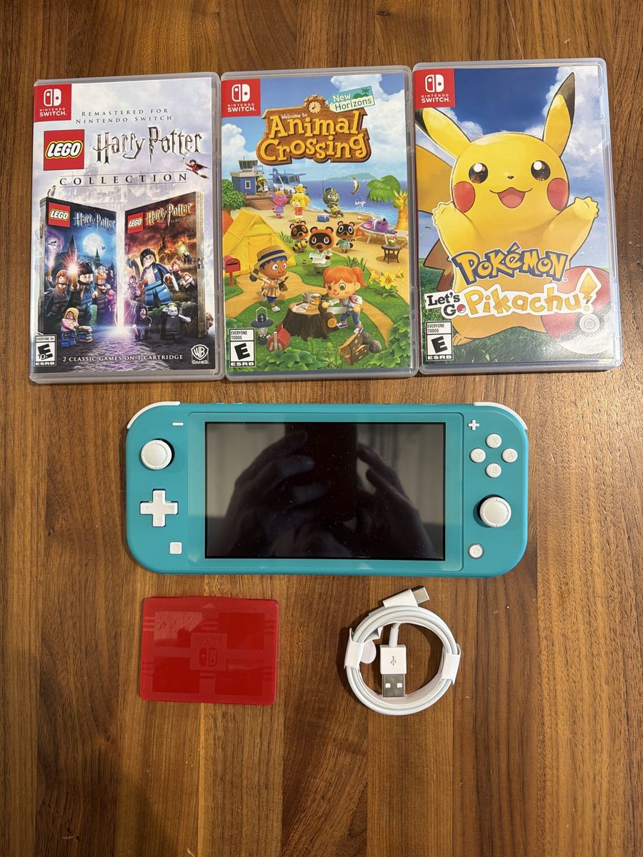 Nintendo Switch Lite turquoise with 3 games