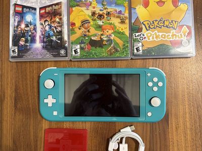 Nintendo Switch Lite turquoise with 3 games