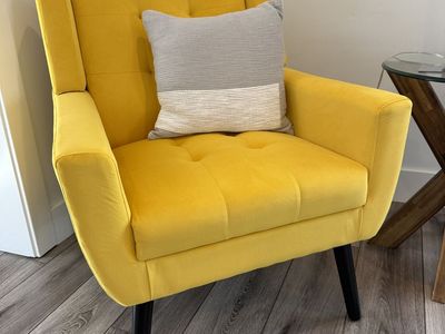 Tufted felt wide back armchair