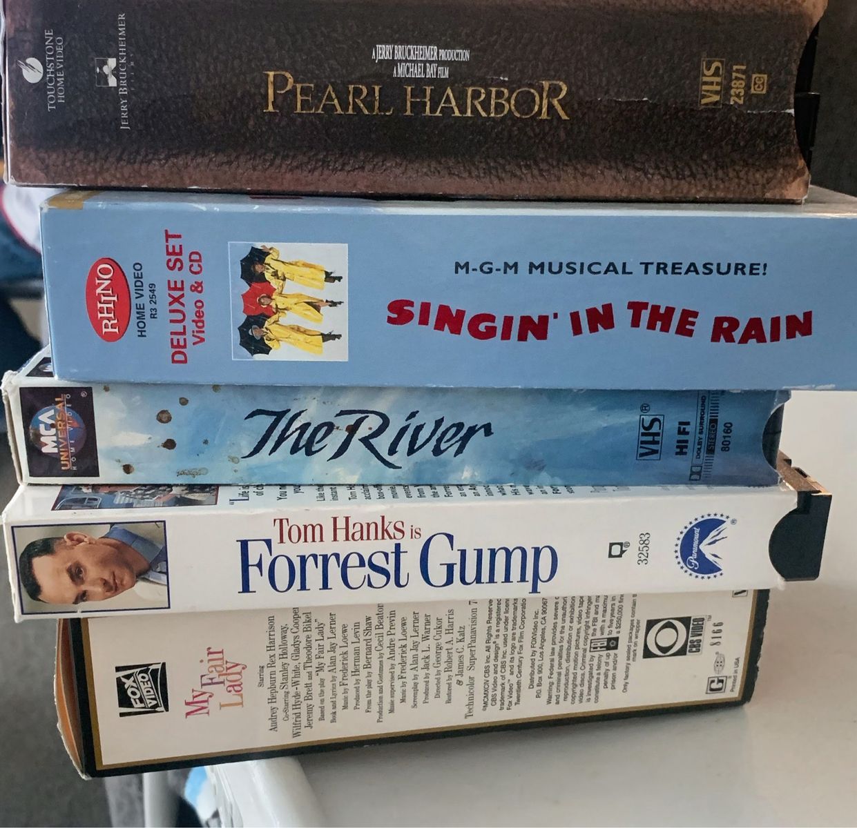 5 VHS Tapes: Pearl Harbor, Singin' in the Rain (Deluxe), The River, Forrest Gump, My Fair Lady