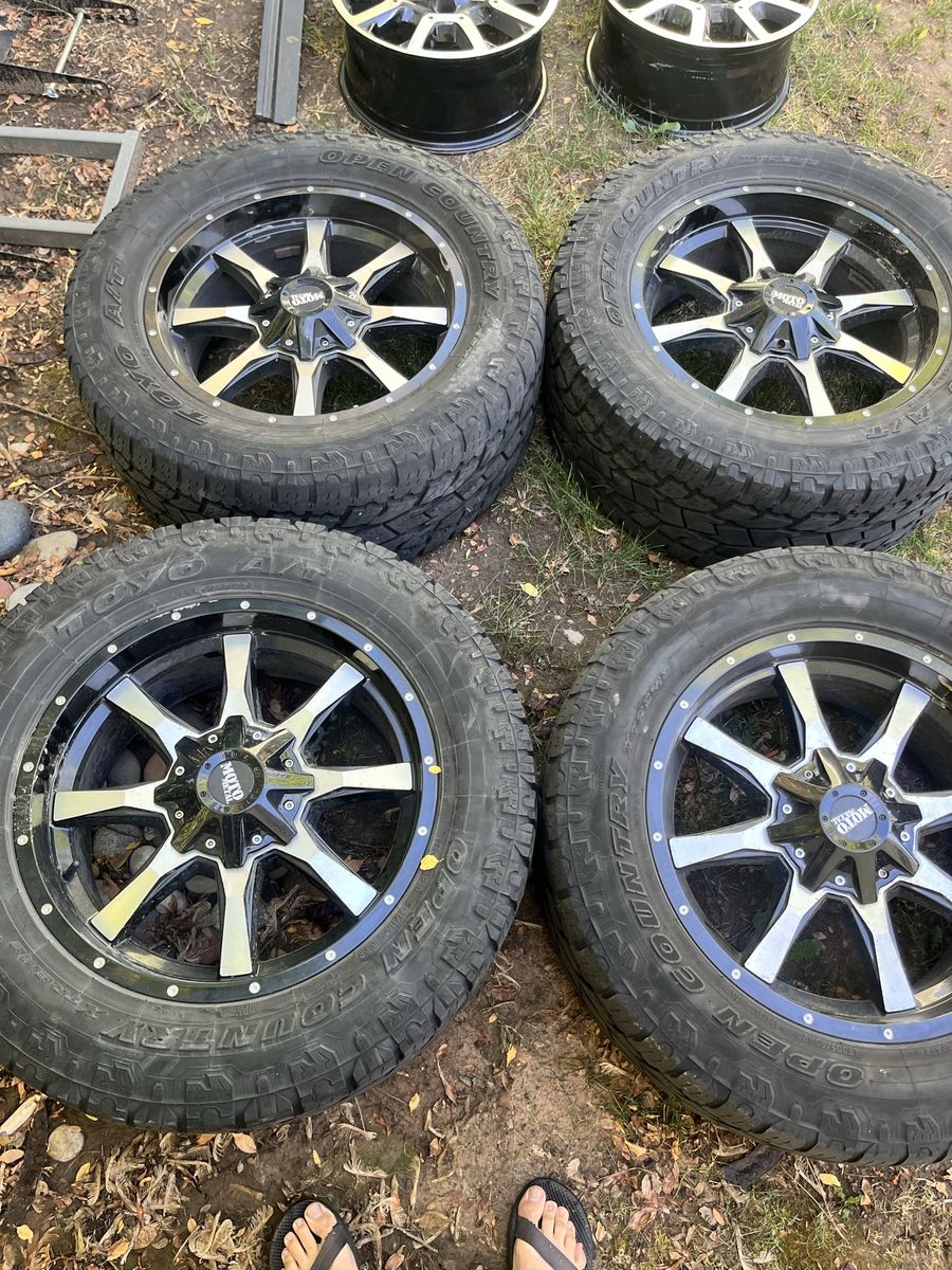 Complete set. 20” wheels with Toyo open country tires.