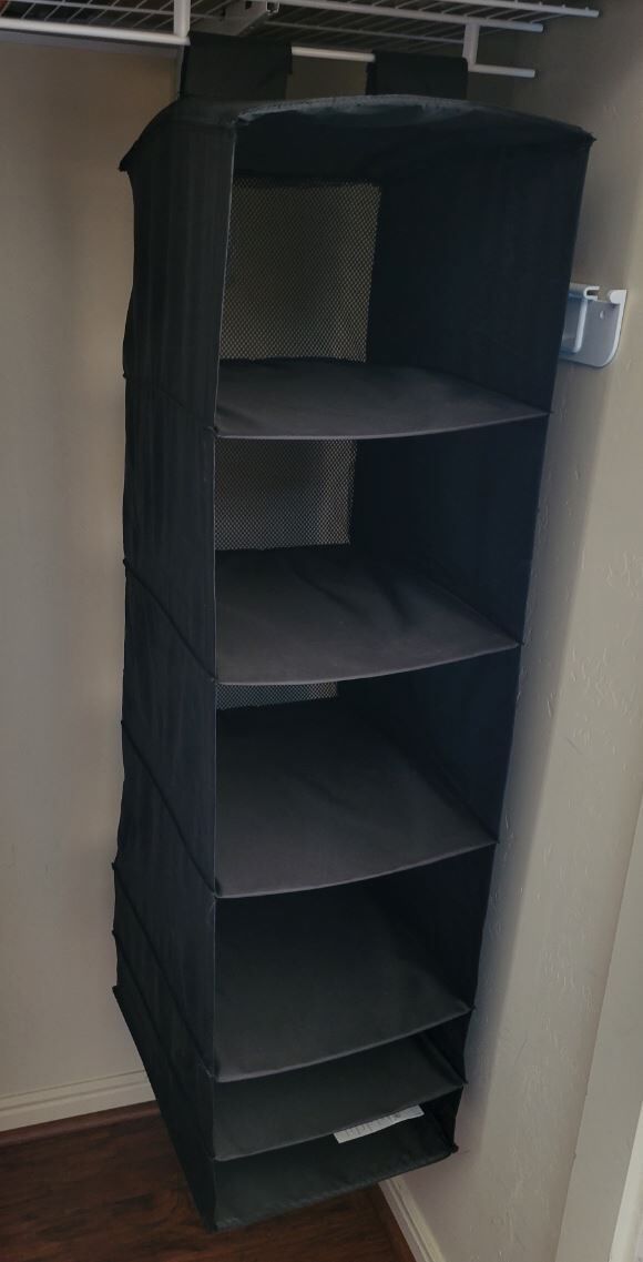Hanging closet organizer / shelf