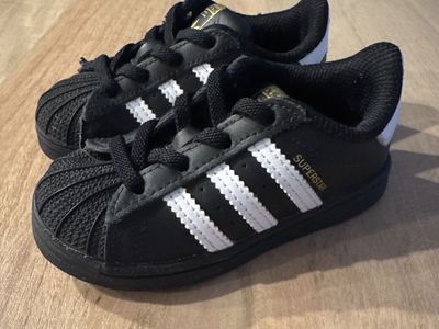 Boys black adidas superstar shoes, size 6