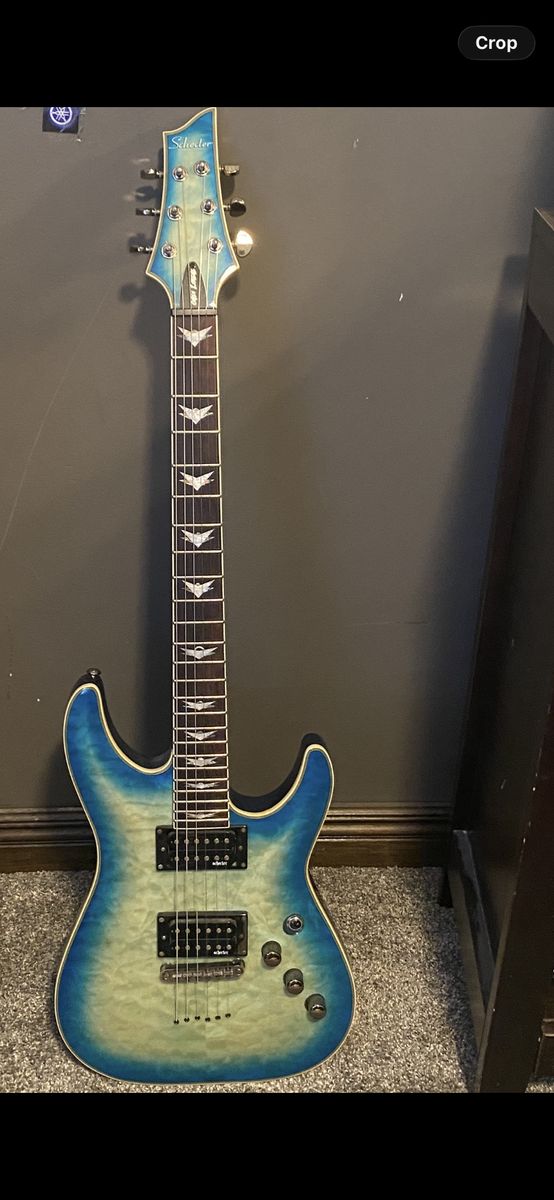 Schecter Omen Extreme-6 Electric Guitar Blue Fade Quilted Maple Top