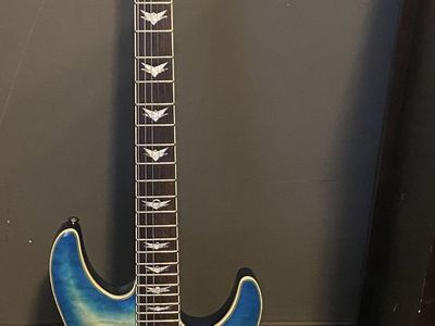 Schecter Omen Extreme-6 Electric Guitar Blue Fade Quilted Maple Top