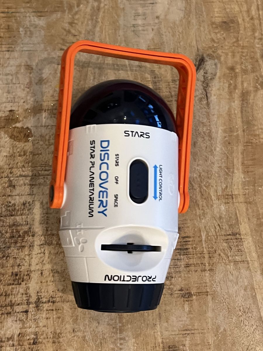 Discovery Star Planetarium Star Projection Light with Orange Handle