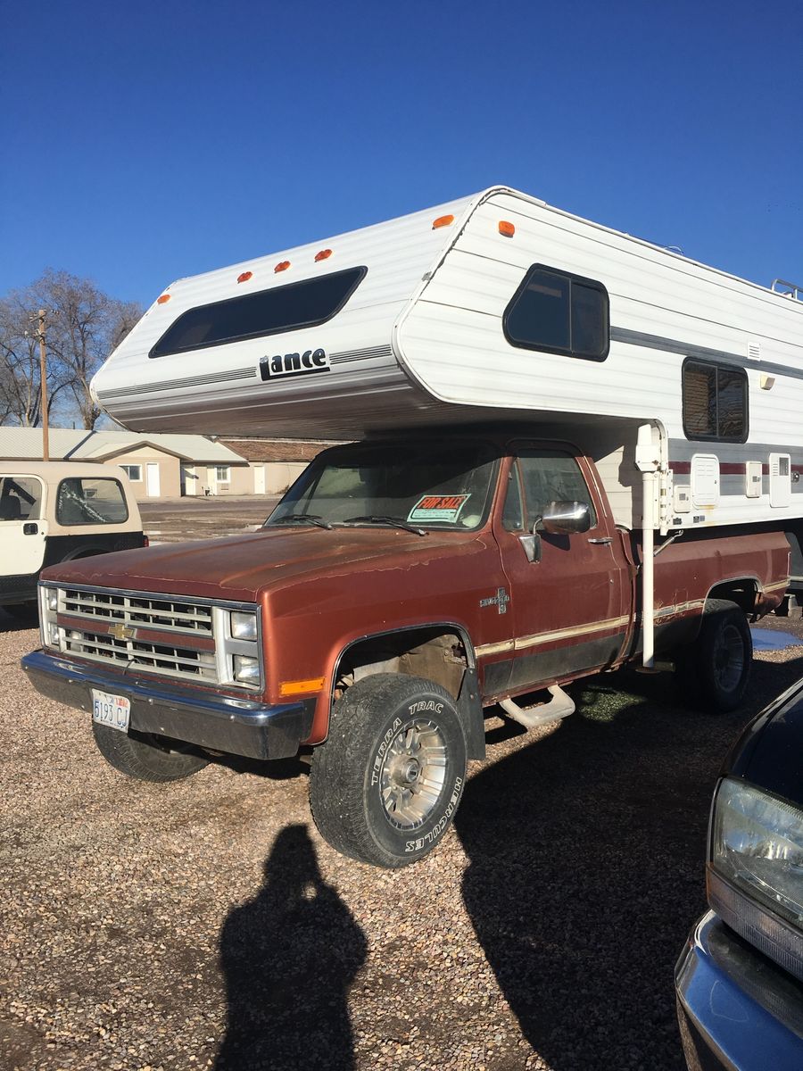 Lance 990 Truck Camper - 11'3" Slide-in RV with Bathroom & Dinette
