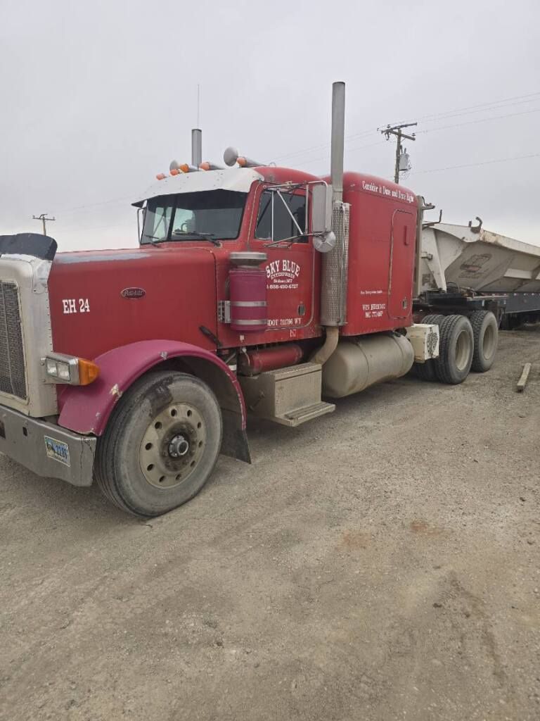 359 Peterbilt and 3 axle sid super tri side dump