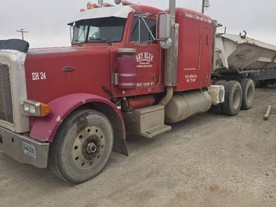 359 Peterbilt and 3 axle sid super tri side dump