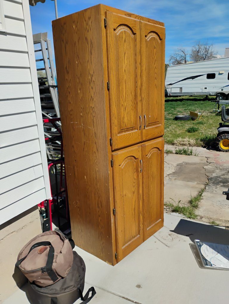 Oak Pantry Cabinet W/ Rollouts Shelves