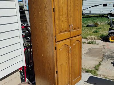 Oak Pantry Cabinet W/ Rollouts Shelves