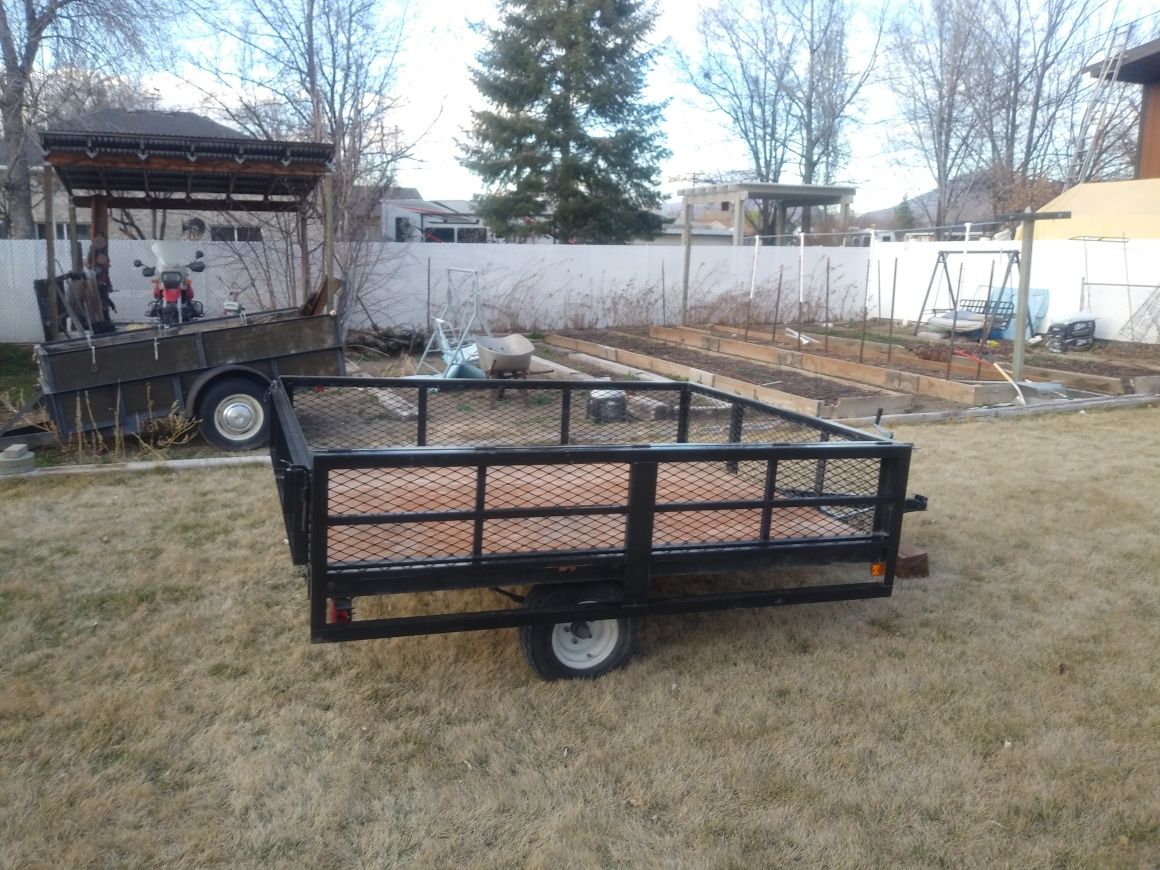 ATV and landscaping 6.5 x 8 utility trailer with Bi-fold side loading ramp