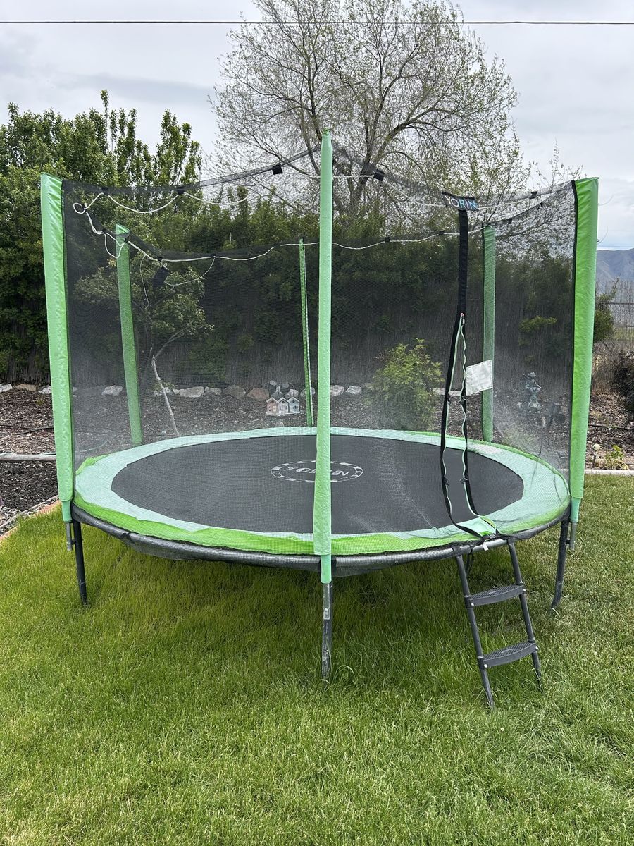 10 Feet Yorin Enclosed Trampoline With Ladder, 2 Years Old, good shape.