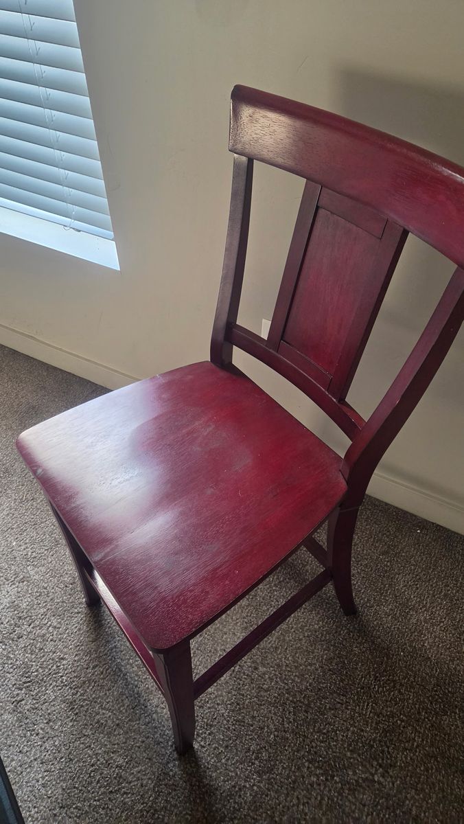 Four Red wood chairs