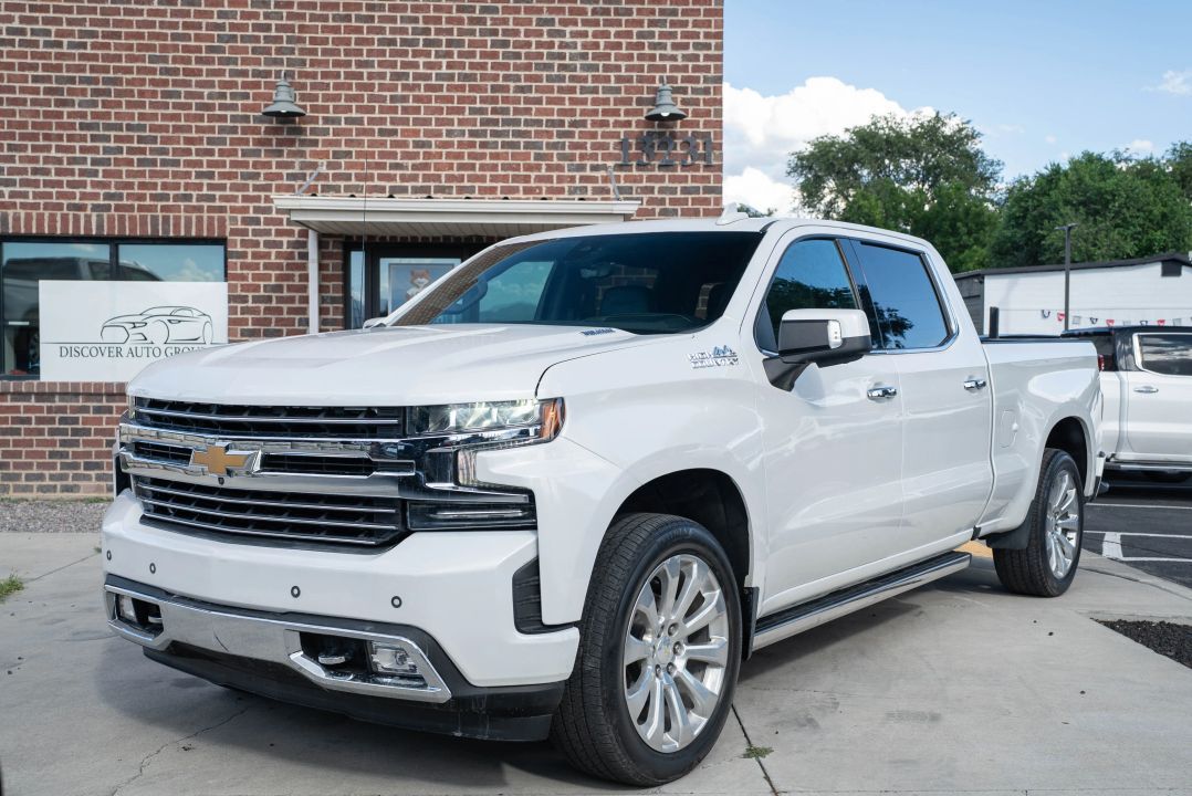 2021 Chevrolet Silverado 1500 High Country — rebuilt & branded title, 17% below market
