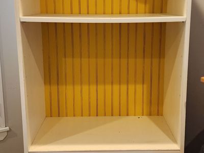 Cabinet with two adjustable shelves. Very sturdy!