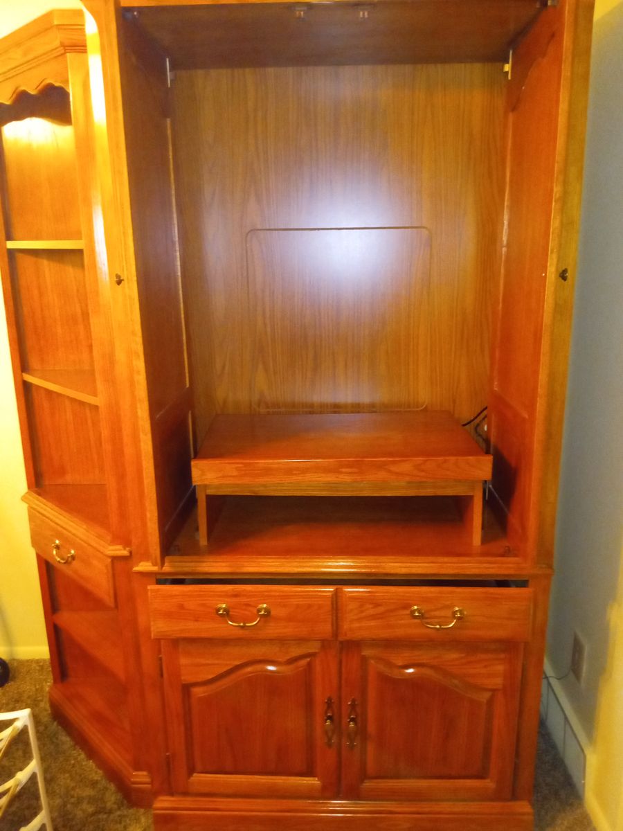 Wooden Entertainment Center with Side Shelving and Storage Cabinet