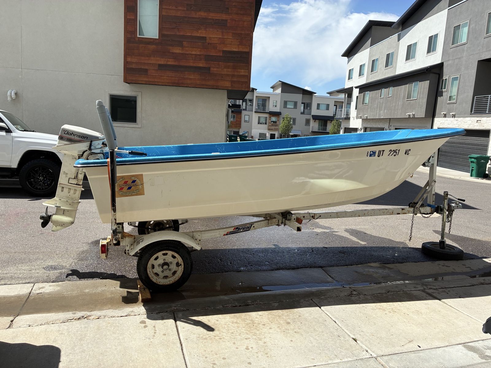 1986 14’ Livingston Boat with Johnson 15 Outboard Motor and Trailer