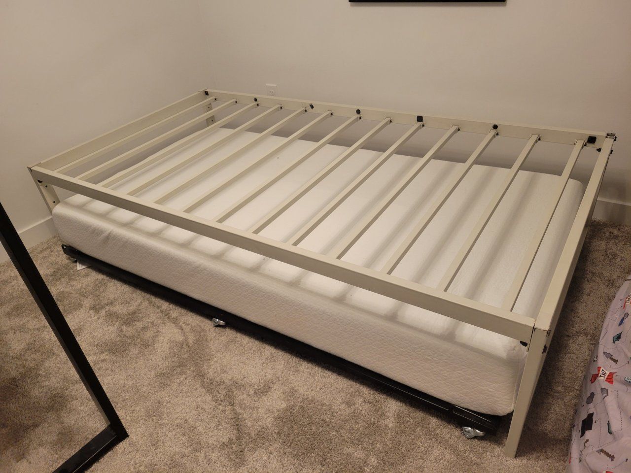 Bed frame and trundle.