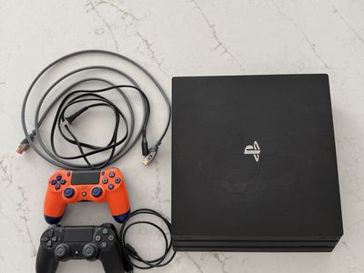 PlayStation 4 Pro 1TB (CUH-7215B) + 2 Sony Controllers + All Cables