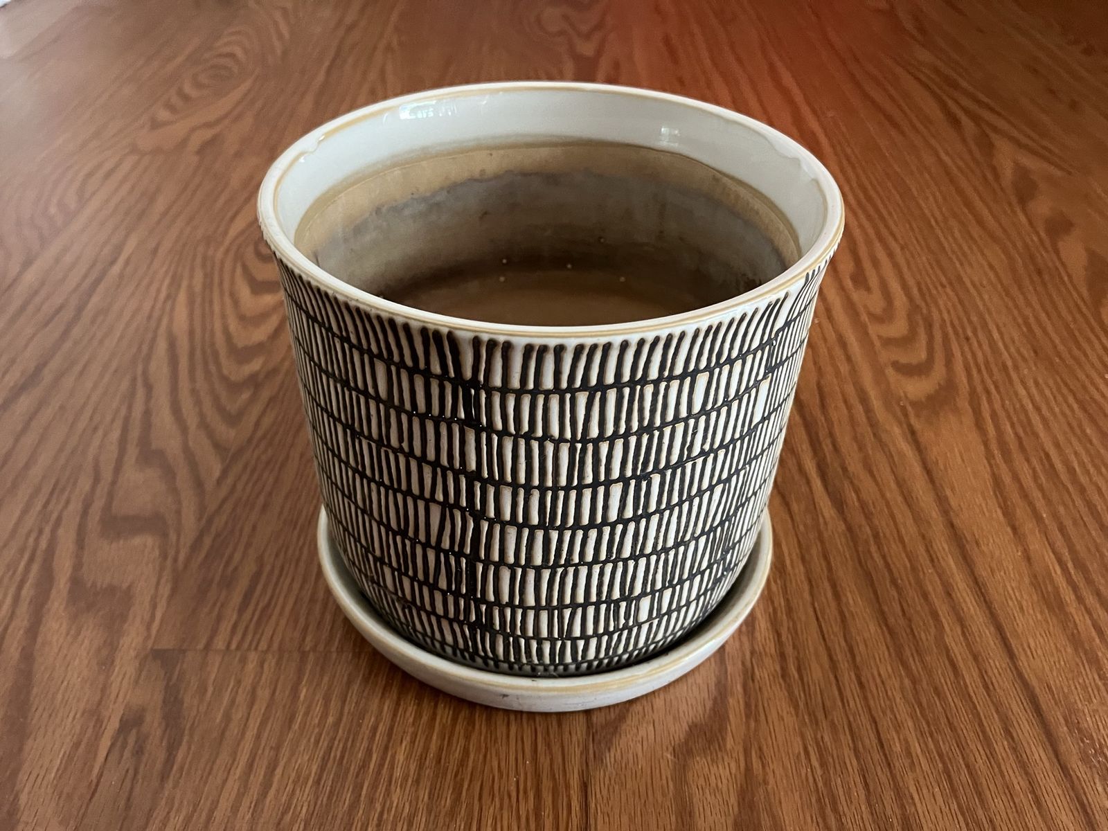 Ceramic Planter Pot with Drainage Hole and Saucer - beige and brown design.