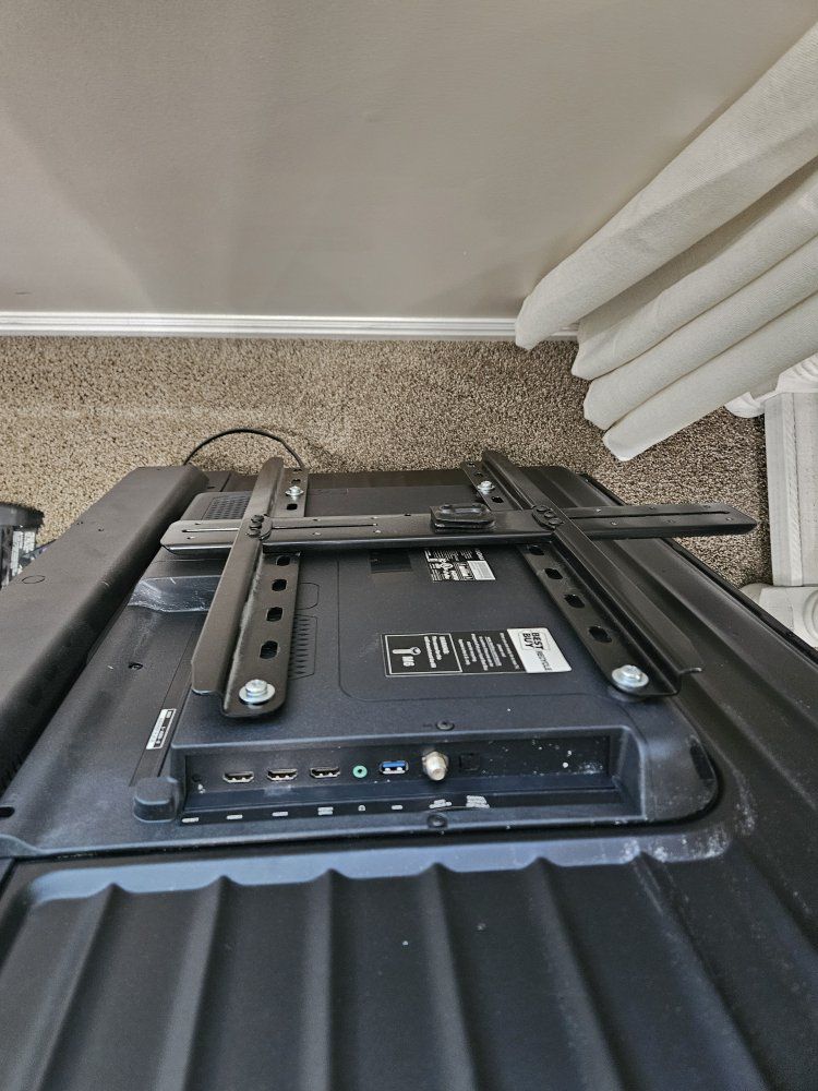 Insignia TV with swivel wall mount
