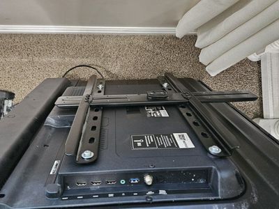 Insignia TV with swivel wall mount