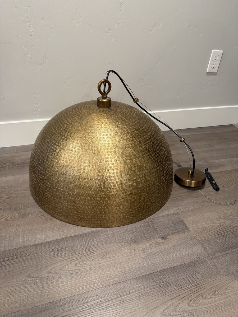 Hanging gold light fixture