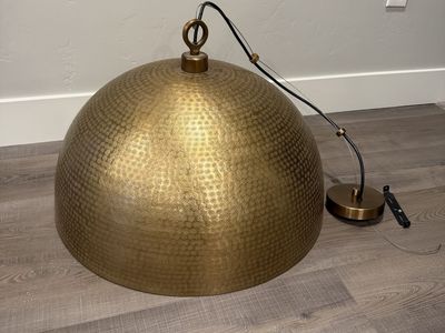Hanging gold light fixture