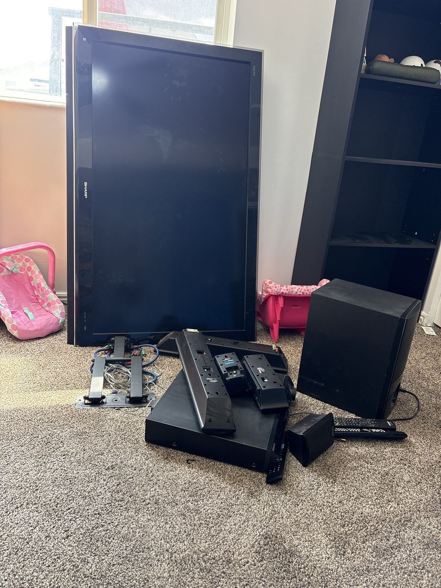 Sharp Aquos Smart TV with Sound System and Wall Mount