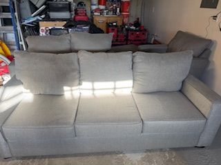 Gray sofa, loveseat, chair, and ottoman