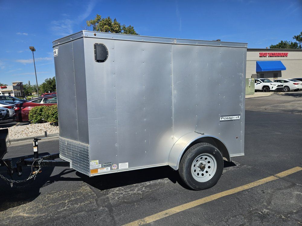 like new 2022 5x8 + v nose Haulmark Passport Enclosed Cargo Trailer - Silver, Single Axle
