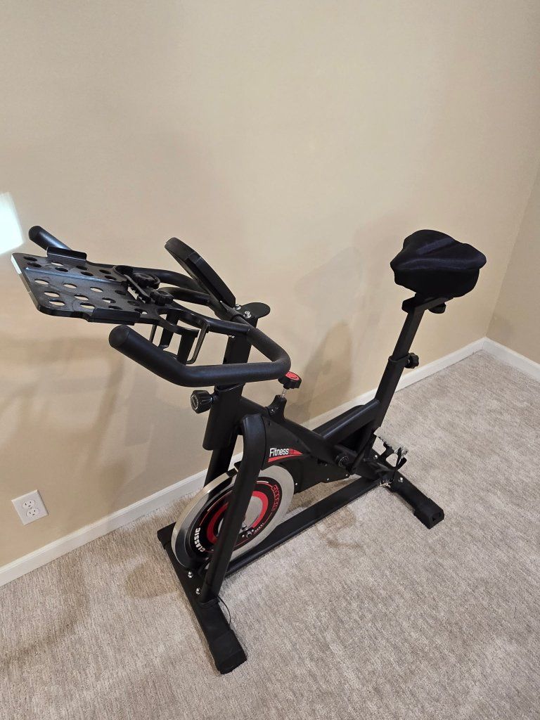 Fitness Reality Exercise Bike with Tablet Holder and Digital Monitor - Indoor Cycling Spin Bike