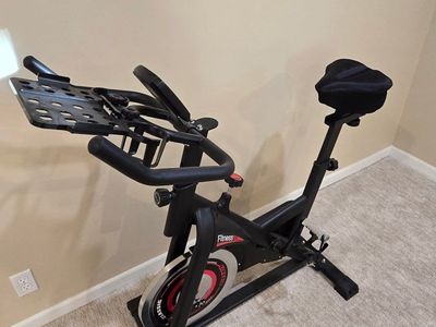 Fitness Reality Exercise Bike with Tablet Holder and Digital Monitor - Indoor Cycling Spin Bike