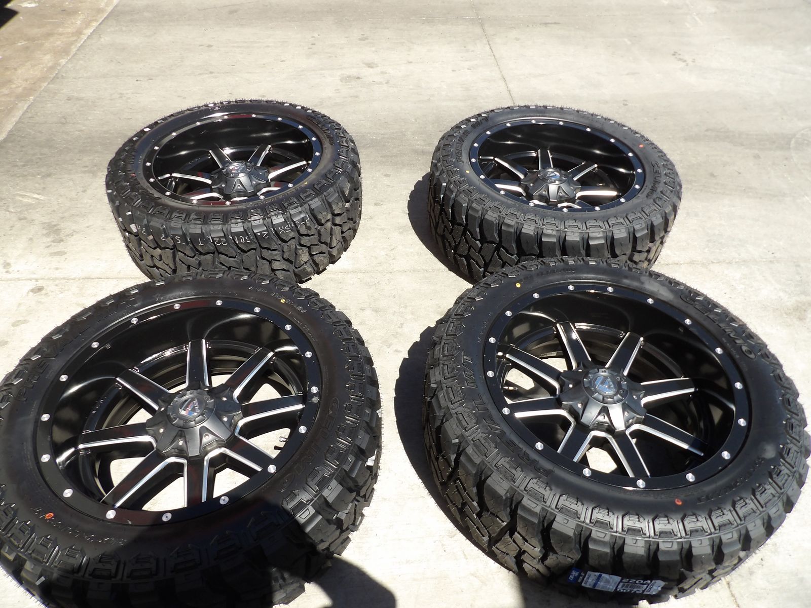 SET OF USED FUEL WHEELS 22" INCH 20X10 8X170 AND NEW TIRES LT35X12.50R22 CELIMO PREVAIL MT