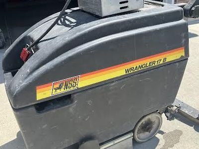 Self-propelled floor scrubber
