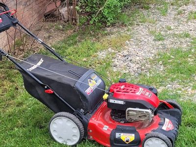 troy-bilt self propelled lawn mower good working