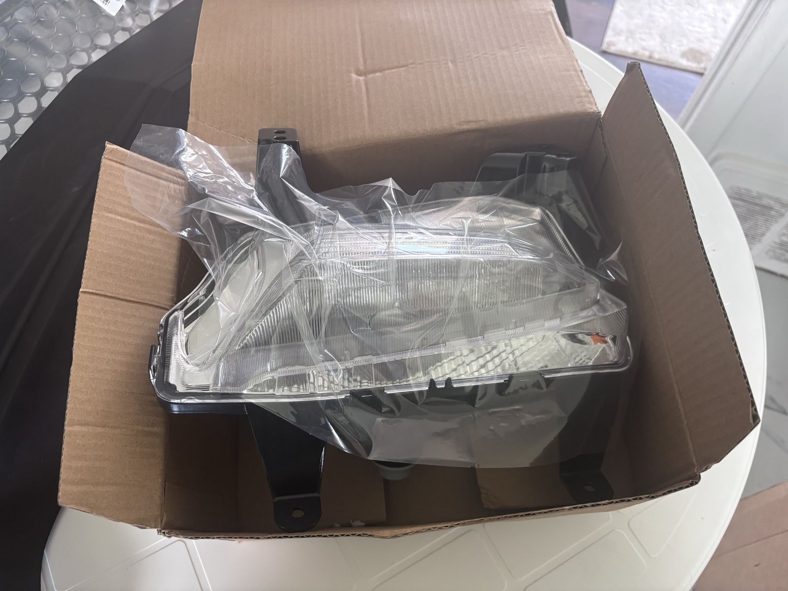 New Car Headlight Assembly - Unused Replacement